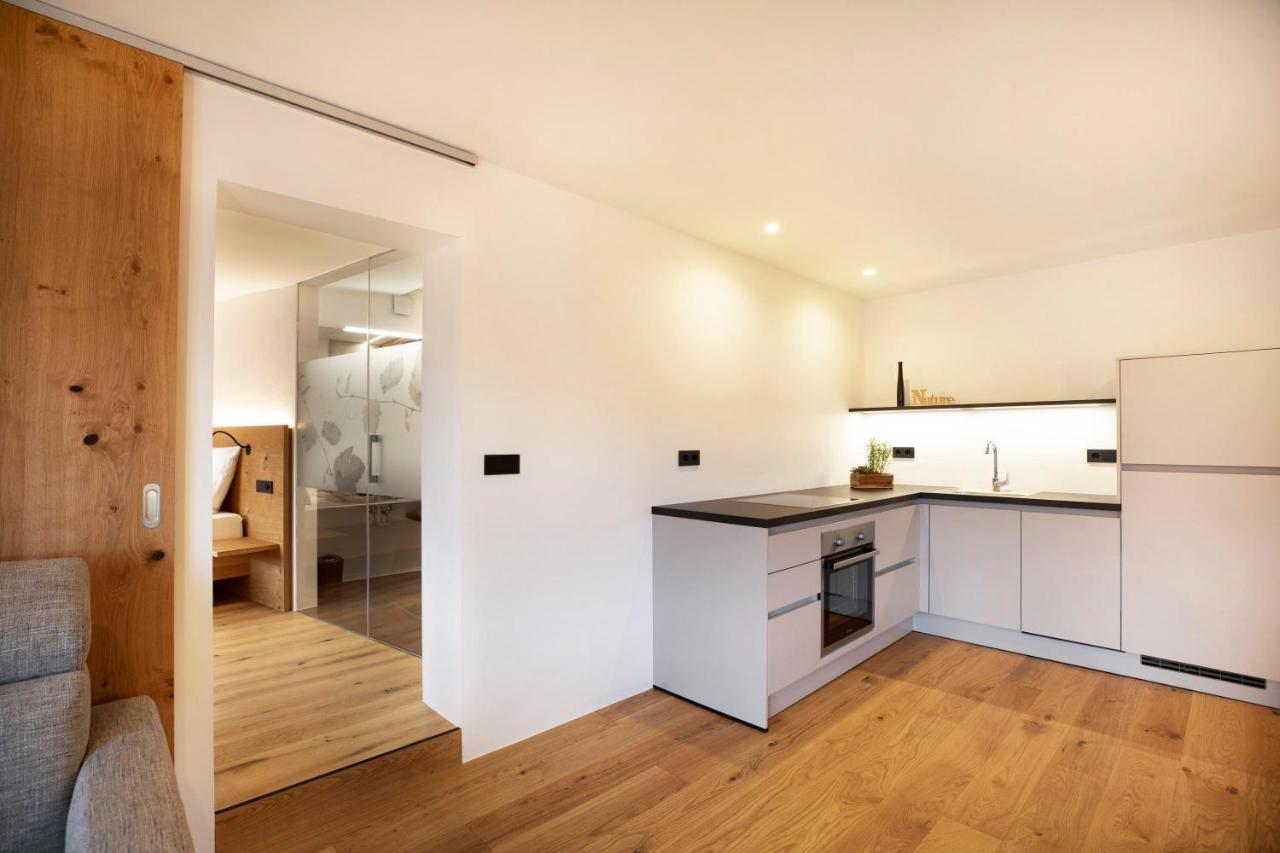 Brantenhof Ferienwohnung Vinea Cortaccia Bagian luar foto